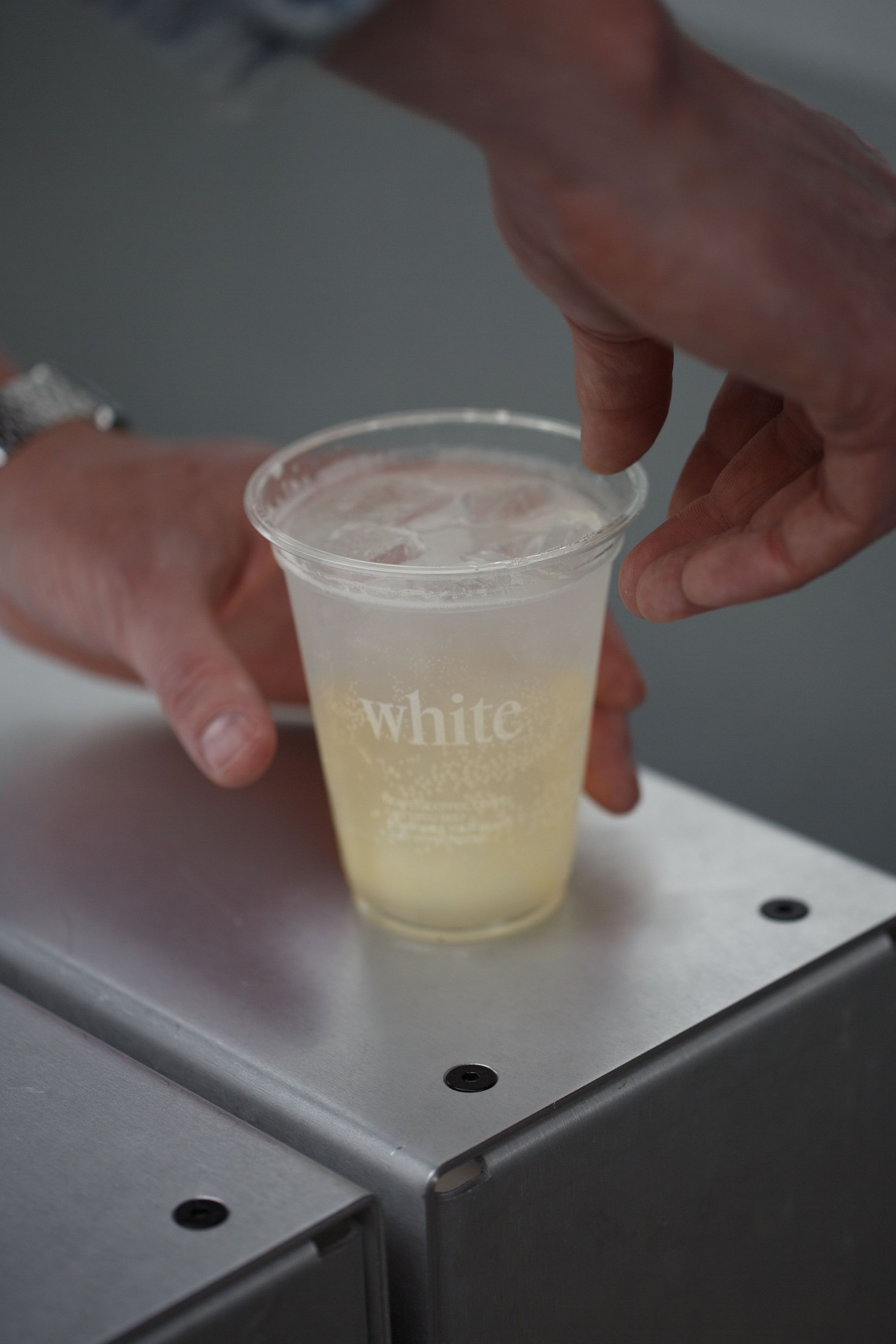 Iced coffee served in a glass, highlighting WHITE Coffee's offerings as a premier café in Paris.