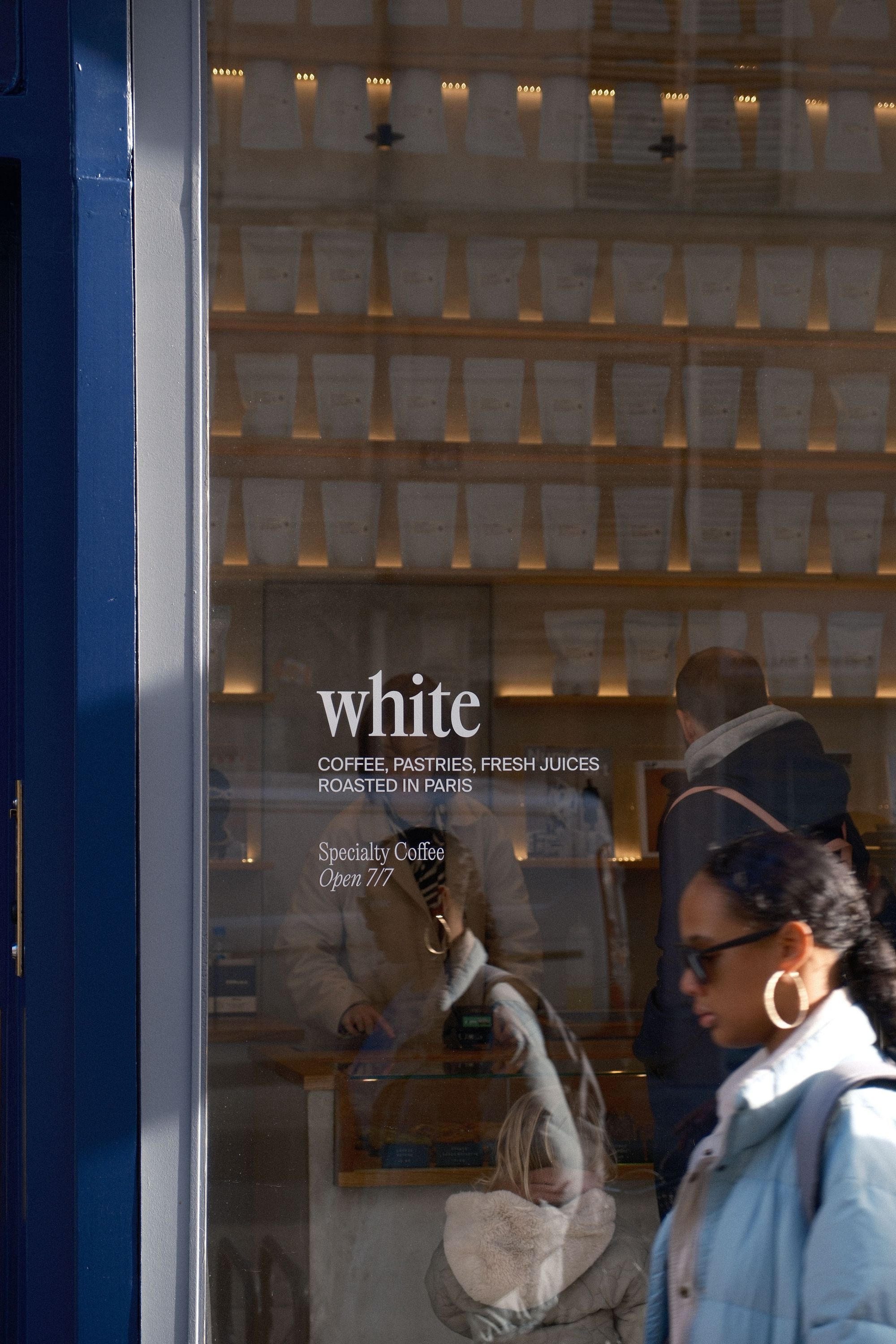 White Coffee in Paris 3 offers specialty coffee, pastries, and fresh juices in a stylish café setting.